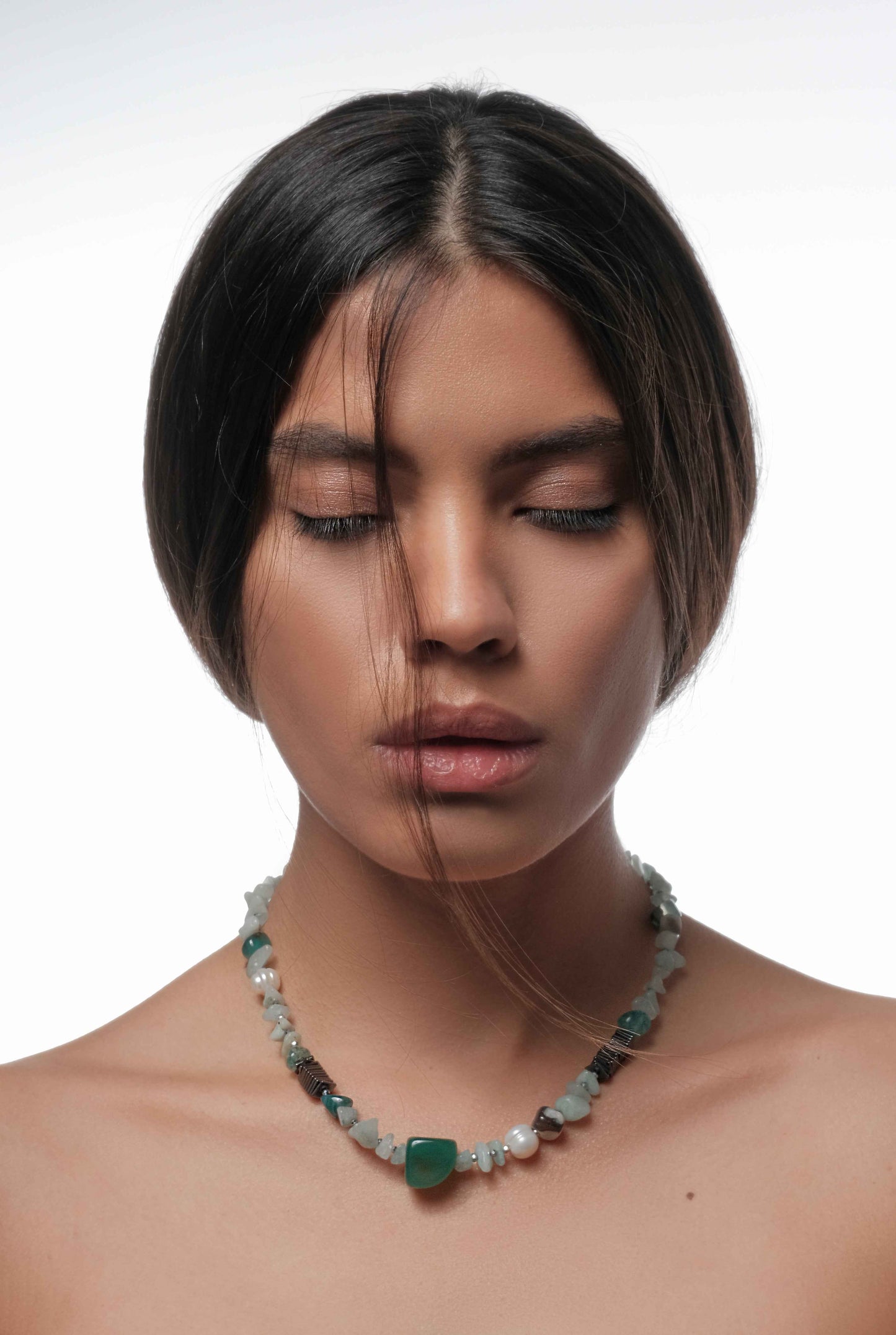 Necklace with green gemstone