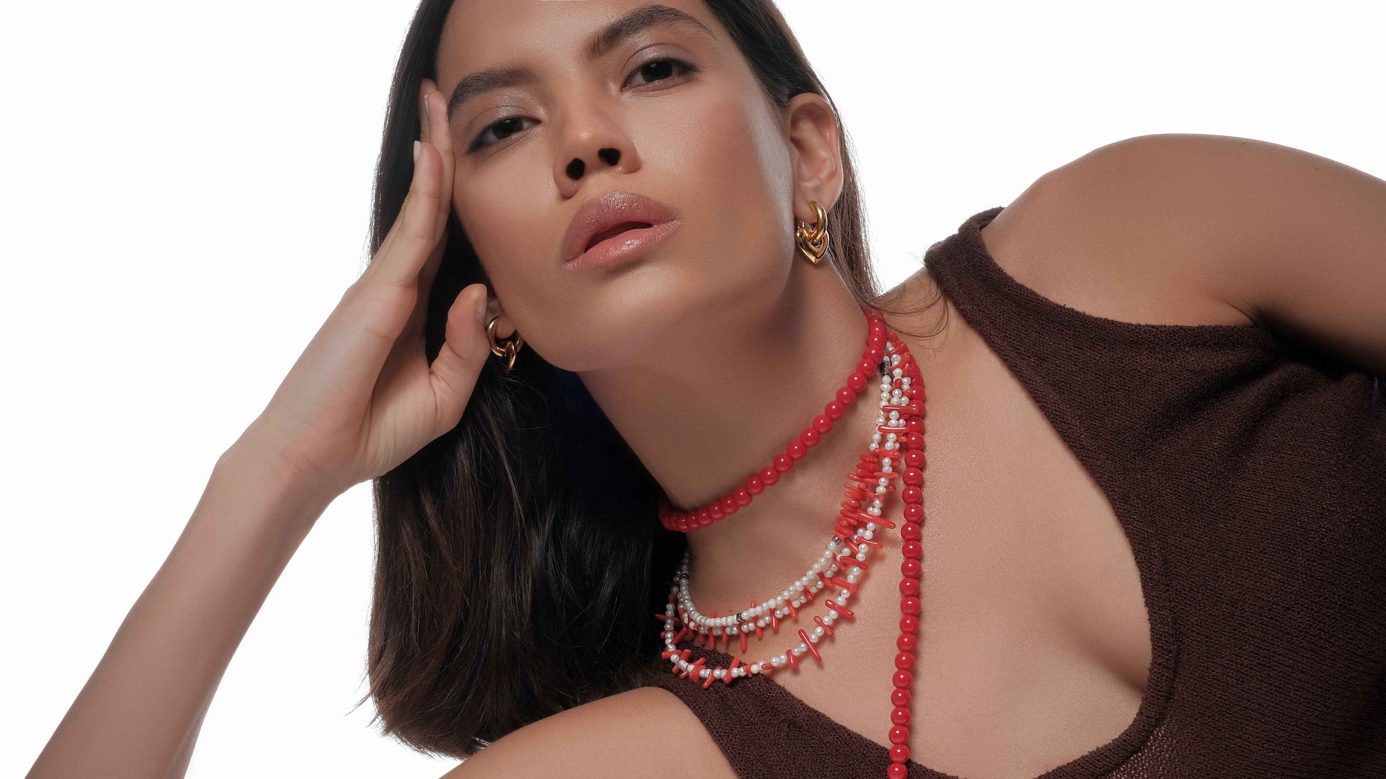 necklace set with red gemstone and pearl